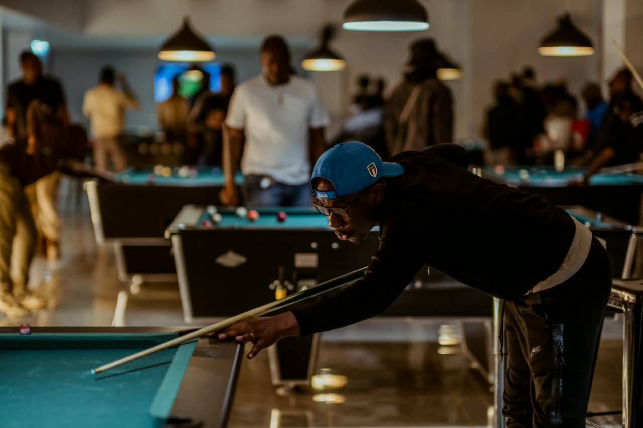 Player lining up a pool shot